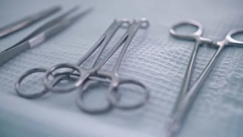 Surgical medical instruments on the table Stock Footage 150884576