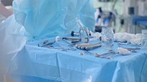 Surgical medical instruments on the table Stock Footage 150885925