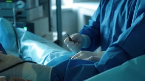 Surgical operation of the stomach. Operating room, surgeons perform an operation Stock Footage 228884102