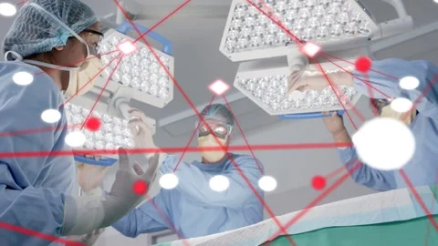Surgical team adjusting LED lights over drape forming moving red node network Stock Footage 332981623
