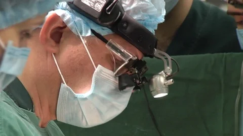 Surgical team doing open heart surgery in modern operating room Stock Footage 72494853