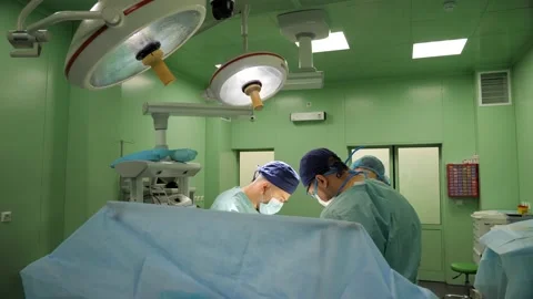 Surgical team during the operation. Teamwork, real operation. Stock Footage 132161271