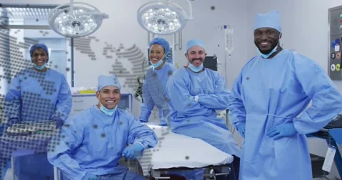 Surgical team posing by gurney under light, dotted globe passing left to right 動画素材 330508858