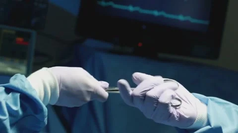 Surgical Tool Hand-Off in Operating Room Stock Footage 314303658