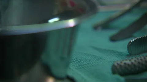 Surgical tools on surgeon's tray (forceps, tweezers, bowl) HD Video Stock Footage 61831715