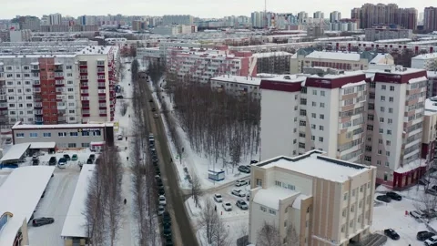 Surgut city in winter. Foreign language school - Big Ben. Aerial view. Stock Footage 181824973