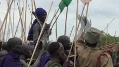 Children making a donga stick fighting i, Stock Video