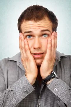 Surprised amazed man Stock Photos