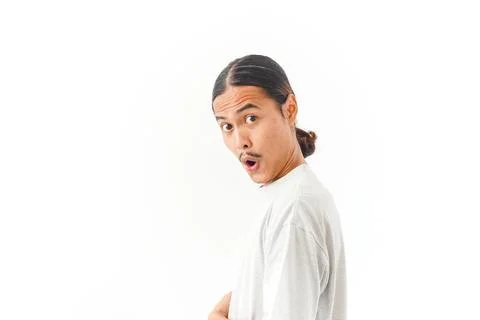 Surprised Asian man looking at camera with open mouth Stock Photos