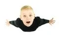 The surprised boy look to the camera. View from above Photo