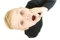 The surprised boy look to the camera. View from above Photo