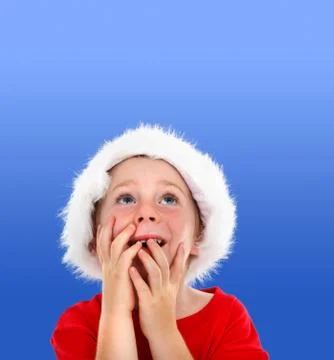 Surprised boy looking up to copy space Stock Photos