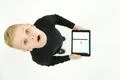 The surprised boy stand with a laptop. View from above Photo