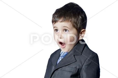 Surprised businessman child in suit with funny face. isolated Stock Photos