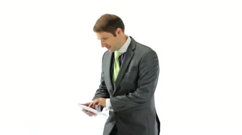 Surprised Businessman Using a Tablet Stock Footage 11528270