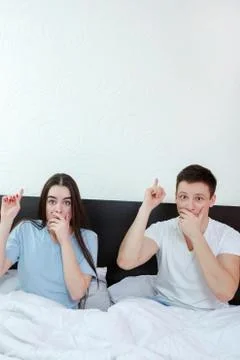 Surprised couple showing up at empty copyspace place cloud Stock Photos