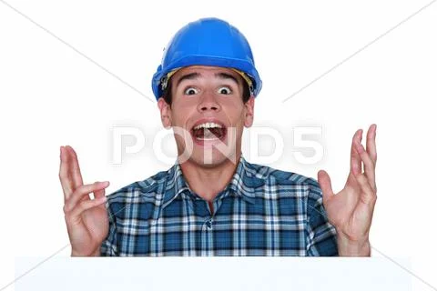 Surprised craftsman screaming Stock Photos