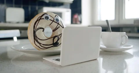 Surprised donut character using laptop. Jaw-dropping shock watching news. Funny Video stock 238489987