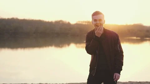 Surprised emotional man looking into the camera. Portrait of a handsome young Stock Footage 108739166