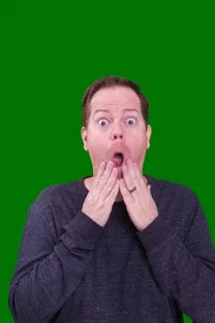 Surprised excited facial expression on redhead male on green screen Stock Photos