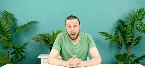 Surprised excited young man opening her mouth in amazement Stock Footage 157351606