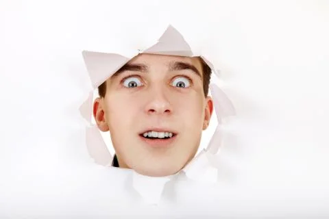 Surprised Face in a Hole Stock Photos