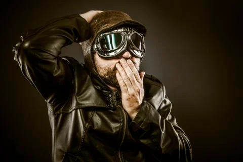 Surprised fighter pilot with hat and glasses era Stock Photos