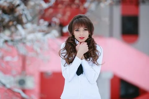 Surprised girl,student with white smile, open smile in winter Stock Photos