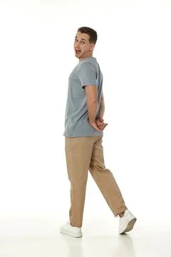 Surprised guy looking at camera on white background Stockfoto's