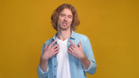 Surprised guy reject his guilt make fail isolated vivid color background Stock Footage 169277273