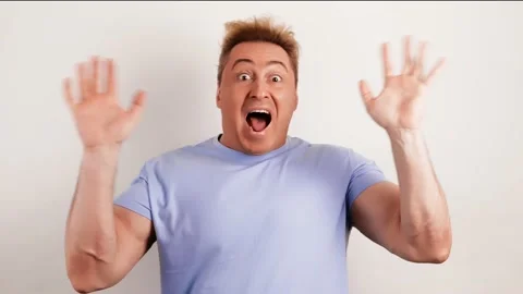 Surprised man with amazed wow expression. Excited guy, oh my god Stock Footage 234531784