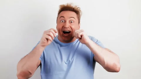 Surprised man with amazed wow expression. Excited guy, oh my god Stock Footage 235367376