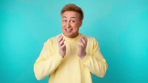 Surprised man with amazed wow expression. Excited guy with open mouth pleasant s Stock Footage 244913323