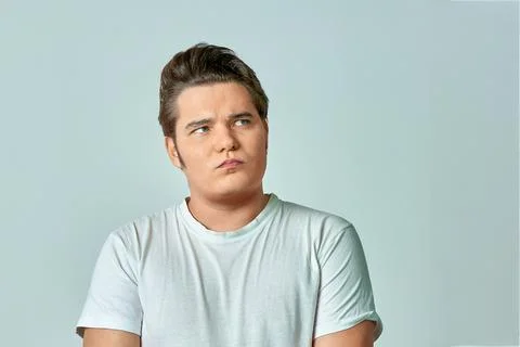 Surprised man on a gray background Stock Photos