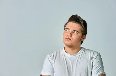 Surprised man on a gray background Stock Photos