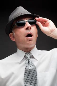 Surprised man looking up Foto stock