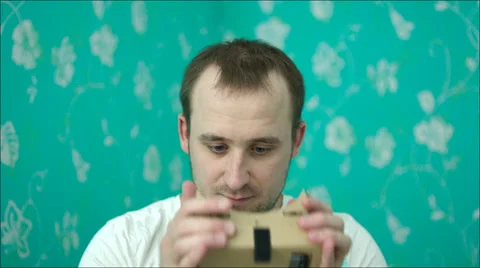 Surprised Man in Virtual Reality Glasses Stock Footage 60385959