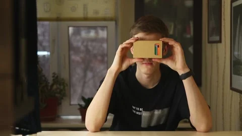 Surprised man in Virtual Reality Glasses. VR. Concent of Virtual Reality gaming Stock Footage 148188785
