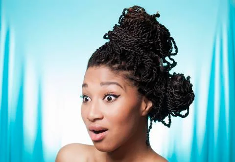 Surprised model on blue background Foto stock