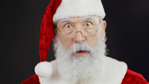 Surprised Santa shaking head playfully Stock Footage 139302471