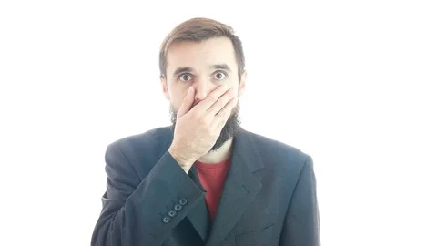 Surprised scared bearded man in suit looking closer and disappearing 库存影片 71592222