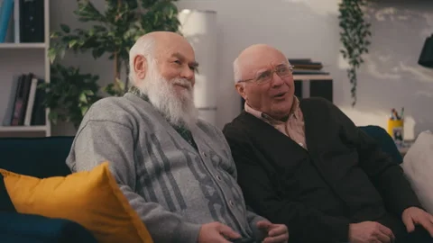 Surprised senior men watching shocking n... | Stock Video | Pond5