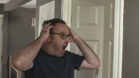 Surprised Terrified Men After Opening a Door in His House Stock Footage 205723100