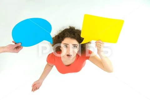 The surprised woman stand with the dialog sign. View from above Stock Photos