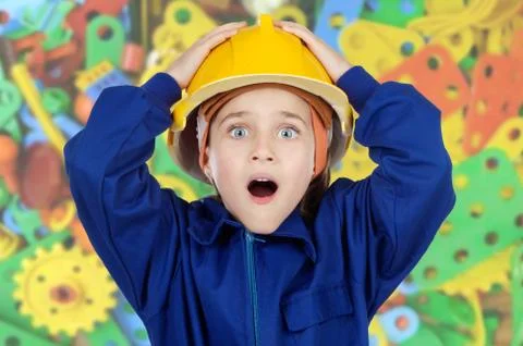 Surprised worker child Stock Photos