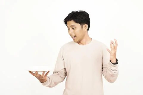 Surprised Young Man Holding Empty Plate Side View Stock Photos