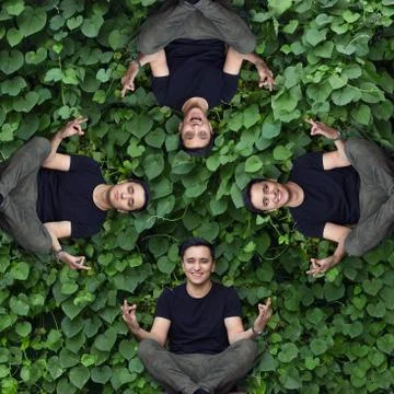 Surreal abstract image with yoga posing young asian man Stock Photos