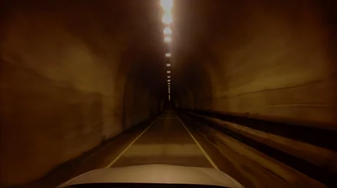 Surreal clip of car accelerating faster and faster through tunnel Stock Footage 42733218