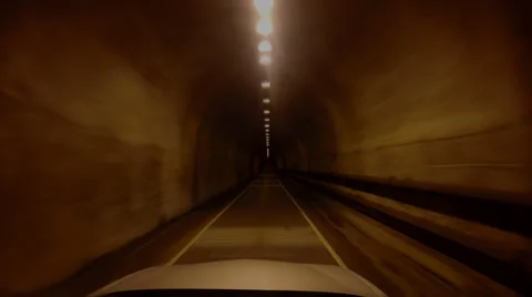 Surreal clip of car accelerating faster and faster through tunnel camera zoom Video stock 42734218