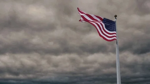 SURREAL FLAG WAVING SLOW MOTION STORM CLOUD TIME LAPSE Stock Footage 83994372